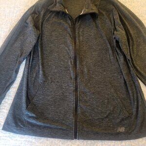 Womans New Balance running jacket, Size large, Dark gray.